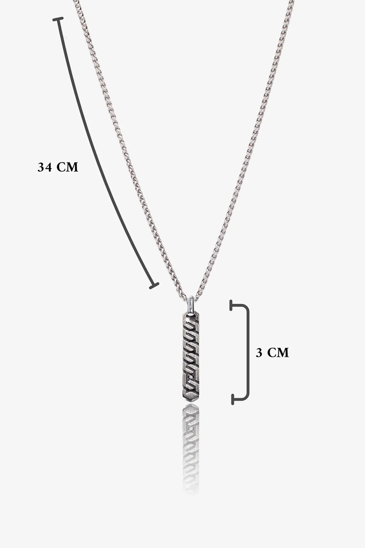 Gümüş renkli metal kolye, 34 cm zincir ve 3 cm desenli asma