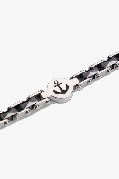 Siyah ve gümüş renkli, çapa desenli metal bileklik