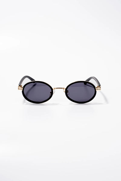 Siyah oval güneş gözlüğü, altın detaylı klasik tasarım
