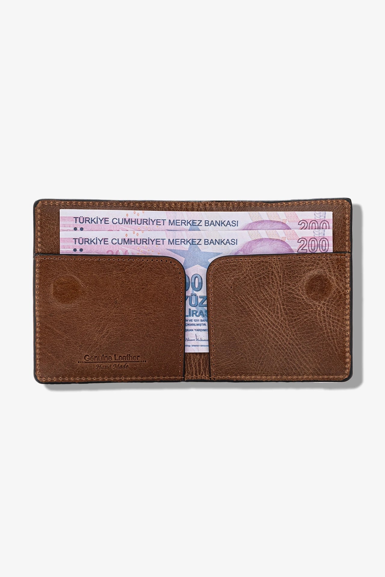 Kahverengi deri cüzdan, içinden 200 TL banknotlar görünüyor