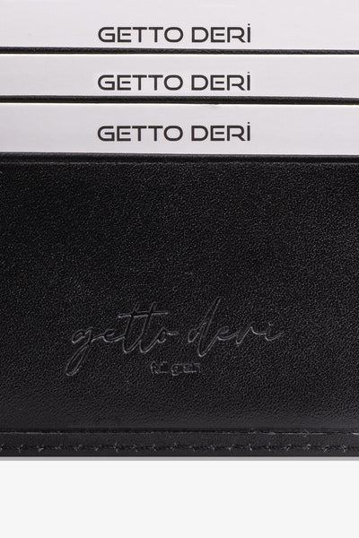 Siyah deri kartlık, ince dikiş detaylı, kaliteli malzeme