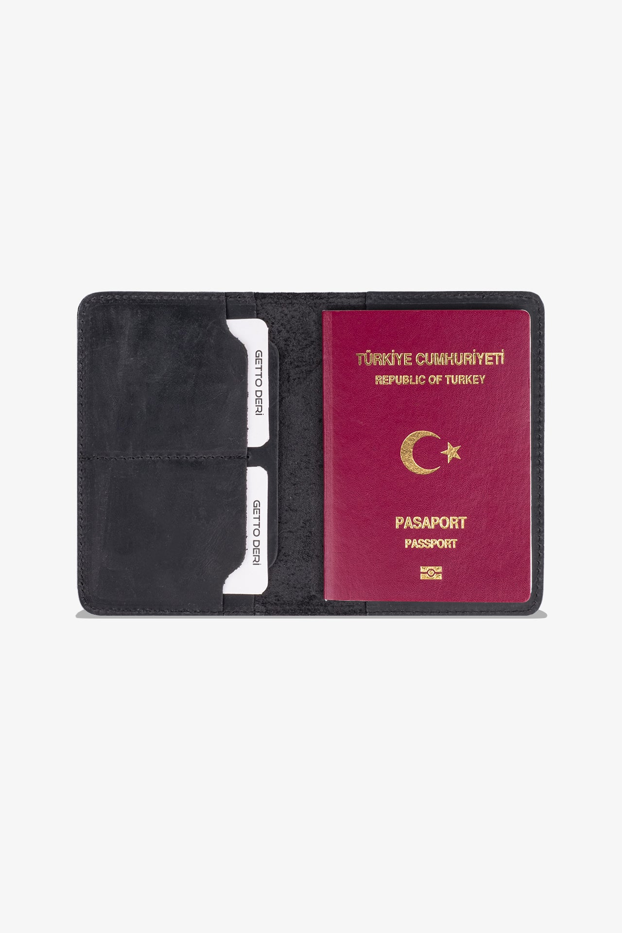 Siyah deri pasaport kılıfı, kartlık ve pasaport içeren seyahat aksesuarı
