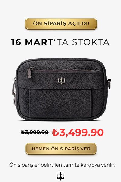 Siyah deri omuz çantası, fermuarlı ön cep ve metal detaylı
